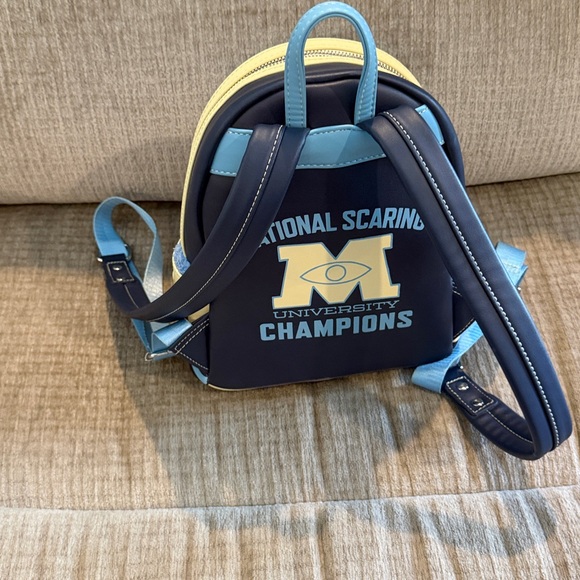 Disney Monsters University varsity jacket Navy and Cream Backpack 10 x 8 - Picture 5 of 10